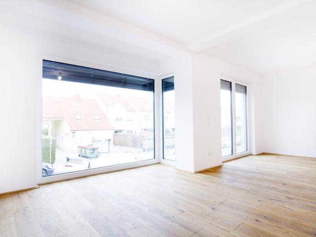 Stilvolles Wohnen mit Eigengarten am grünen Stadtrand von Wien 76.5m² Neuwohnung TOP Preis: 399.000,00 €!