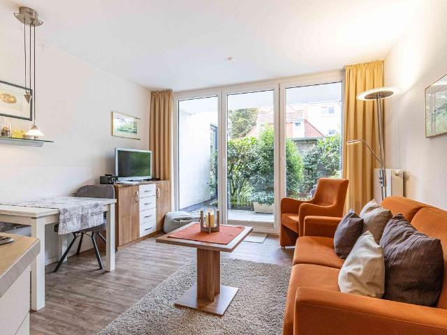 Strandnah auf Norderney – Erdgeschosswohnung mit Terrasse und Garten