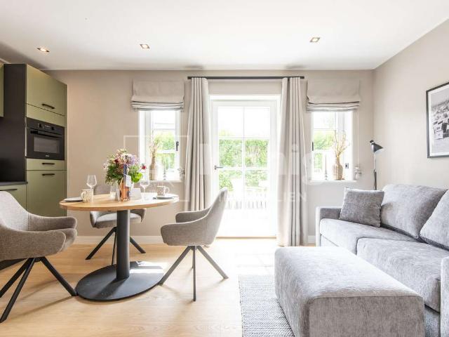 STRANDNAHE UND MODERNE FERIENWOHNUNG