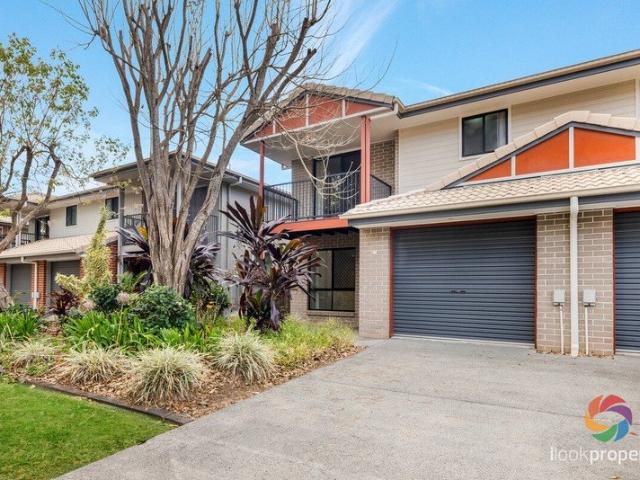 Street facing townhouse in ideal location