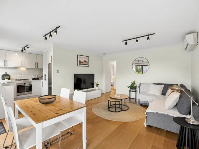 Street front charm with house like privacy in a premier Inglewood border location