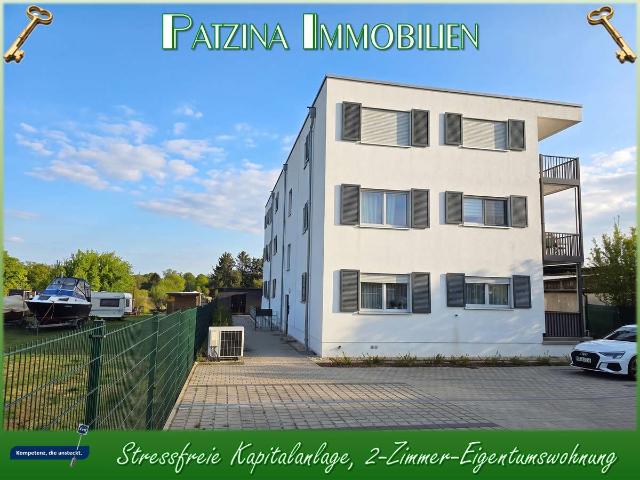 Stressfreie Kapitalanlage, 2 Zimmer Eigentumswohnung in einem sehr effizientem Mehrfamilienhaus