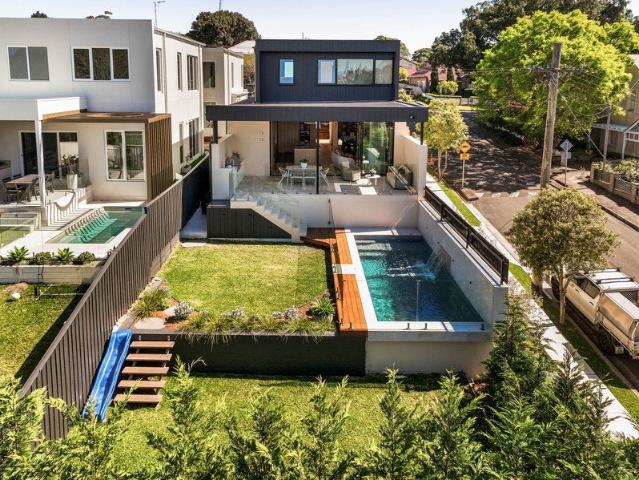 Striking Architectural Family Sanctuary on Premier NE Corner Parcel