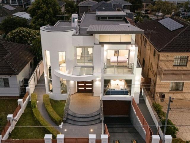 Striking architectural home with granny flat and basement parking of statement, scale and sophistication