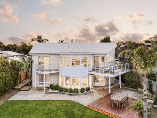 Striking Architectural Retreat with Waters Views