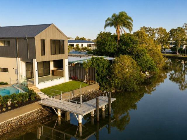 Striking brand new waterfront home BELOW REPLACEMENT COST