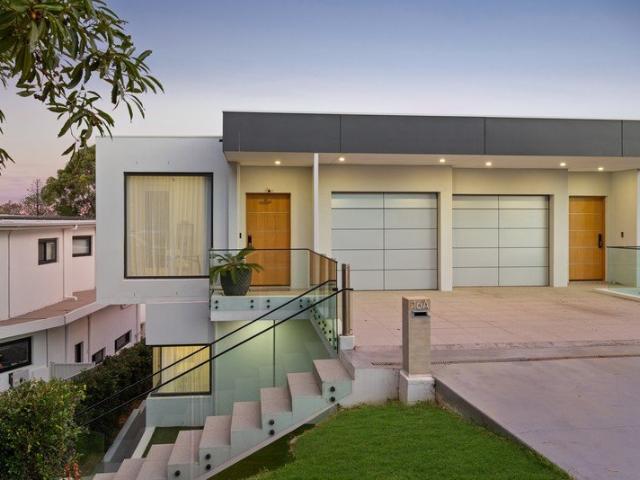 Striking duplex crafted for luxurious family living