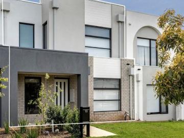 Striking Light Filled Coastal Townhome