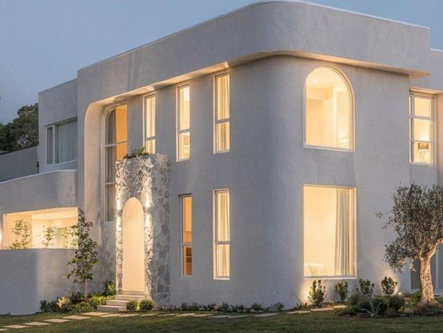Striking new duplex fuses considered architecture with luxurious appointments