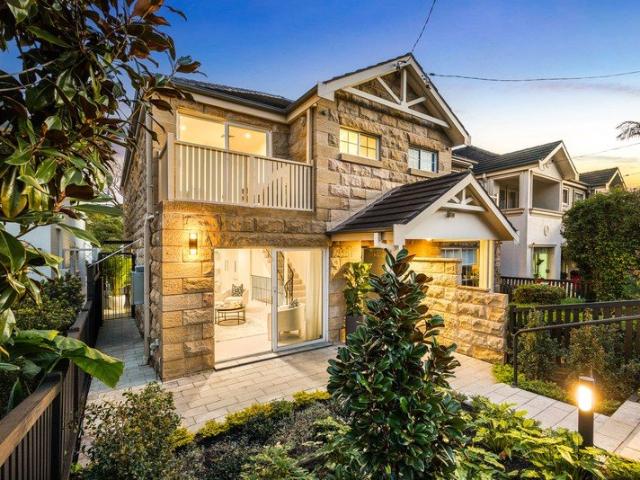 Striking Residence Offering Turnkey Luxury in an Elite Suburb Pocket