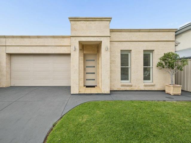 Striking Sandstone Facade with Stunning Tuscan Style Courtyard Living