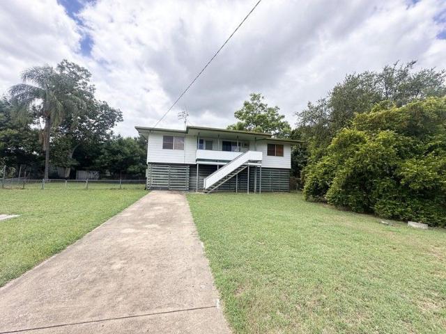 READY TO MOVE IN HIGHSET HOME WITH LARGE BLOCK, FRONT DECK AND ROOM TO GROW