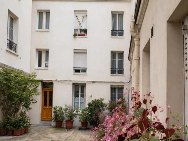 Studio lumineux rue Fondary avec vue Tour Eiffel