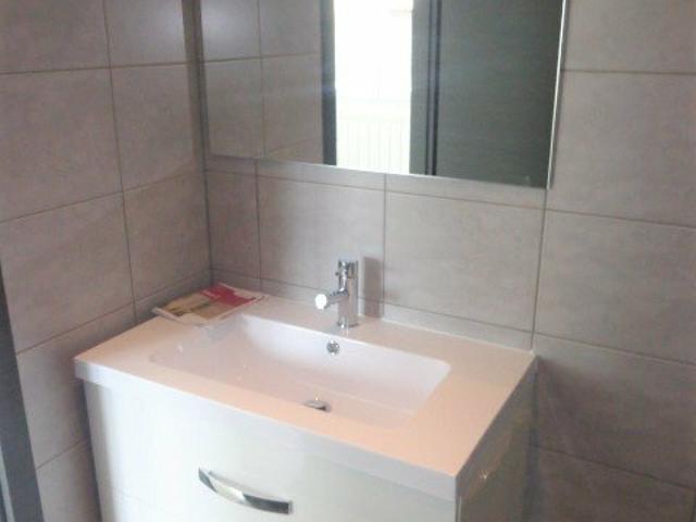 Studio NEUF de 21 m² en RDC avec cuisine équipée et parking
