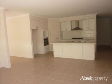 Stunning 4 Bed, 2 Bath Home with Modern Features and Low Maintenance Garden