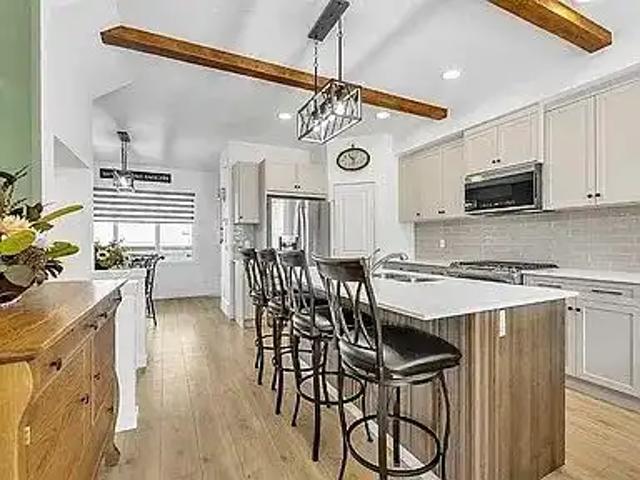 Stunning 4 Bed / 3.5 Bath Townhome with Finished Basement, A/C & Double Garage