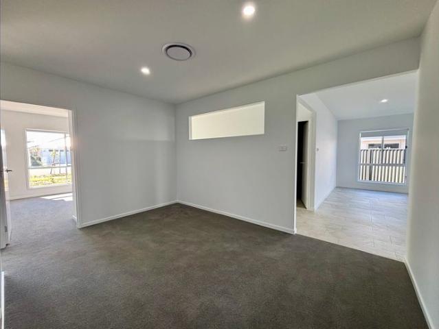 Stunning 4 bedroom home in the highly sought after Moonee Beach Estate is ready to impress!