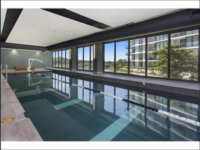 Stunning 1 Bedroom Apartment + Media Room with Elegant Stone Flooring