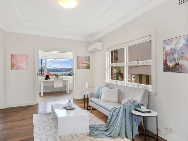 Stunning 2 Bedroom + 2 Sunroom Semi With Harbour Views