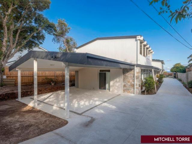 Stunning 2 Story Oasis with Private Beach Access