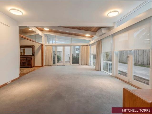 Stunning 2 Story Oasis with Private Beach Access