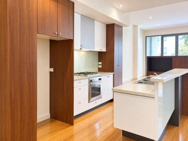 Stunning Three Storey Carlton Residence with Double Tandem Garage