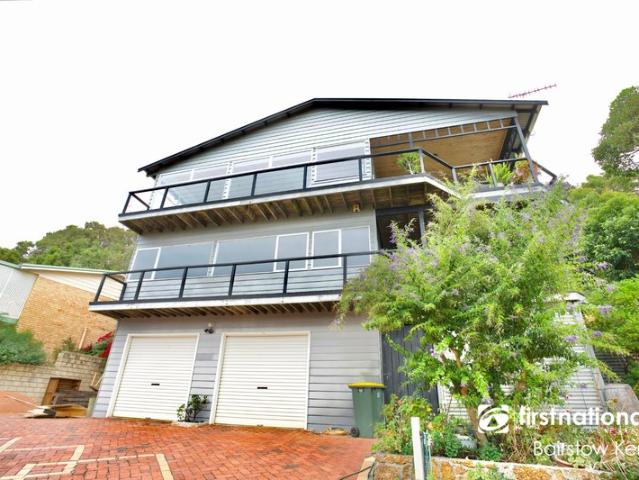 Impressive Three Storey Home in a Highly Sought After Location