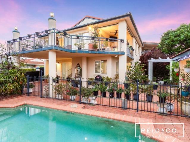 Stunning townhome with private pool and water glimpses