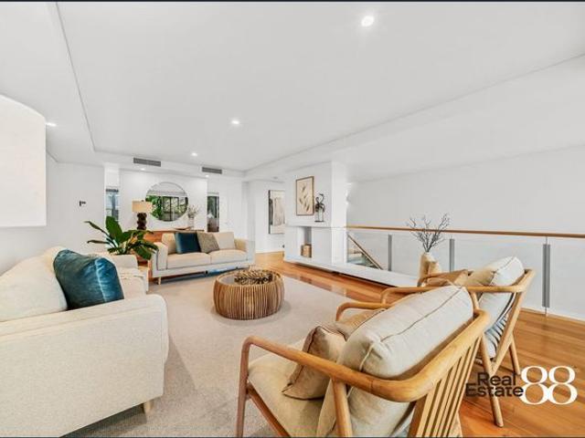 STUNNING TRI LEVEL HOME!
