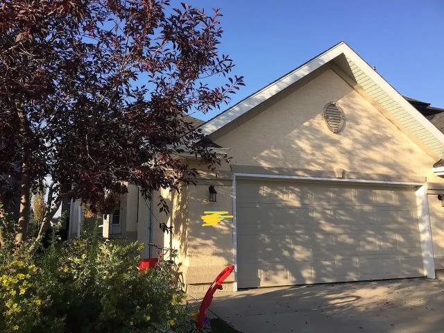 Stunning Tuscany Walk out Bungalow — 1 Bedroom+ Den Main Floor