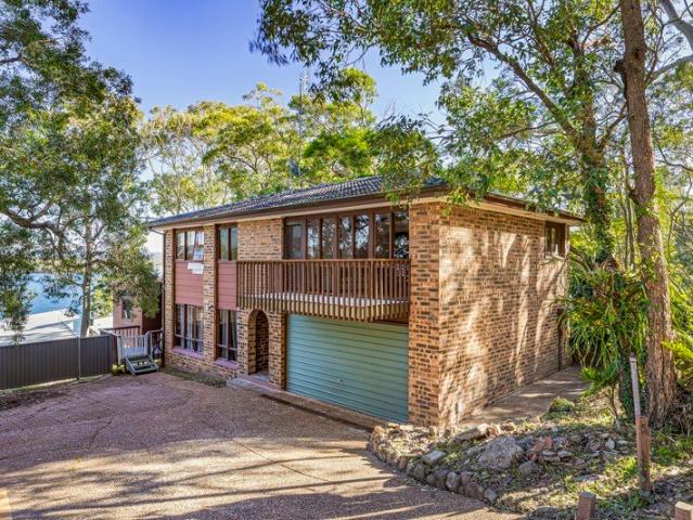STUNNING VIEWS, HOME WITH POTENTIAL PLUS!