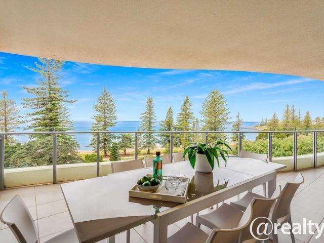 Stunning Water and Island Views From This Luxury Beachside Apartment