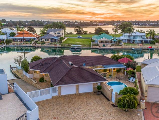 Stunning Waterfront Entertainer with Expansive Canal Views