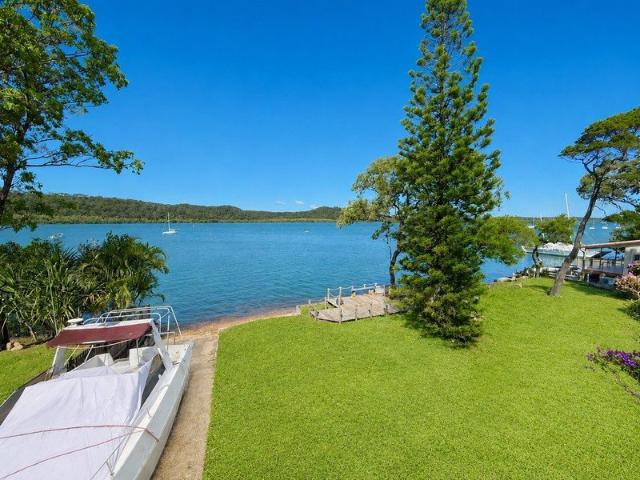 Stunning Waterfront Home with Deep Water Access