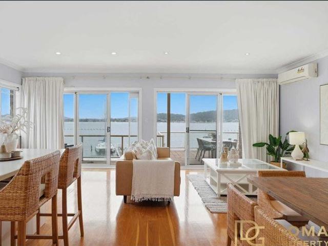 Stunning Waterfront Living with Panoramic Bay Views