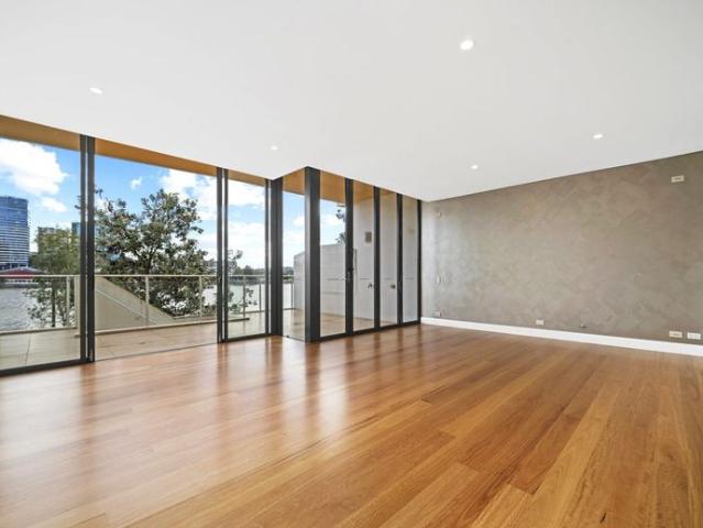 Stunning waterfront townhouse | Dual level living enjoying uninterrupted water views | Rarely offered