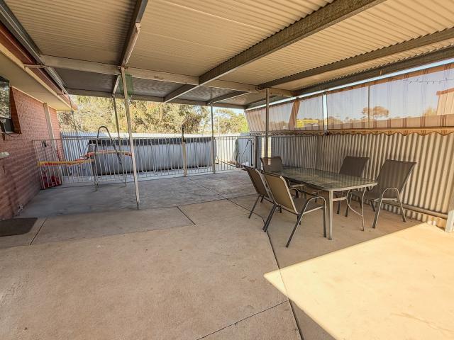 Stunning Well Maintained Brick Home On Large Block With Large 12 x 12 Shed