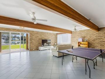 Stunning Absolute Waterfront Family Home with Panoramic North Facing Views