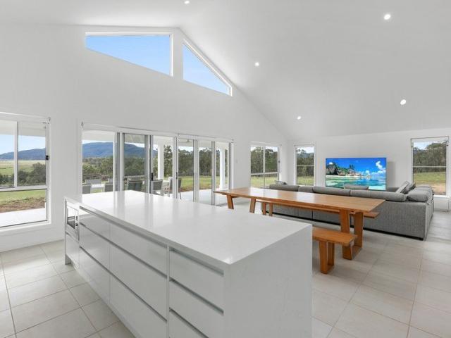Stunning as new Hunter Home set on 2.79 acres