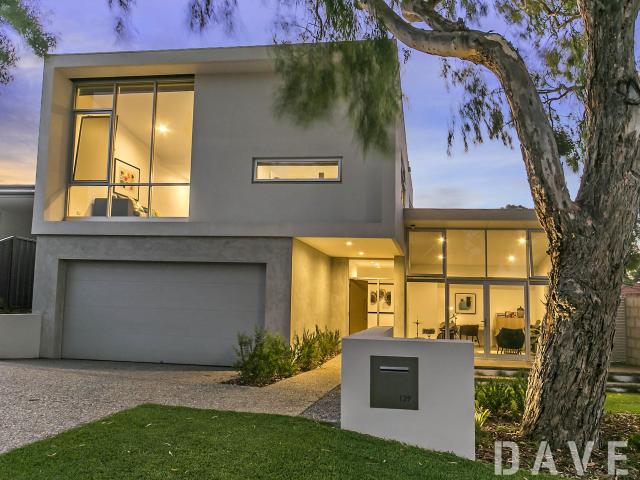 Stunning Architectural Masterpiece in the PERFECT location!