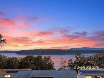 Stunning Basin Views Renovated Coastal Retreat