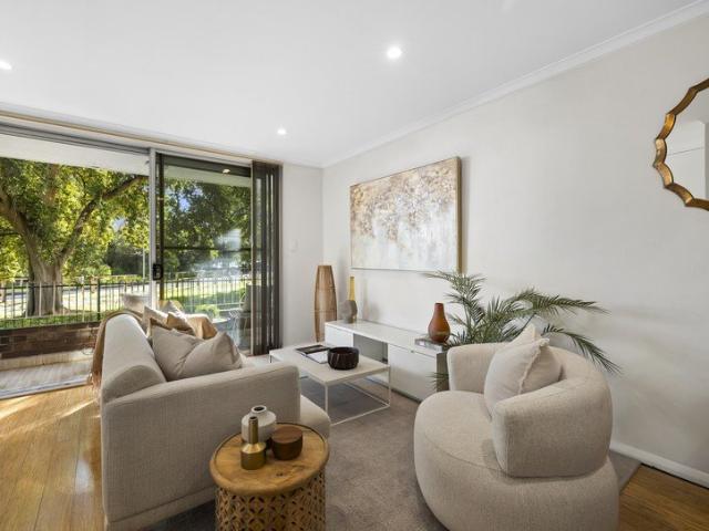 Stunning bayside apartment with water views & parking