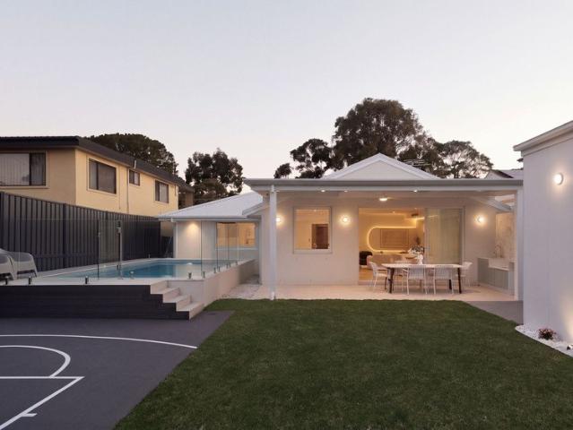 Stunning Brick Family Home with Pool and Basketball Court in a Prime Location