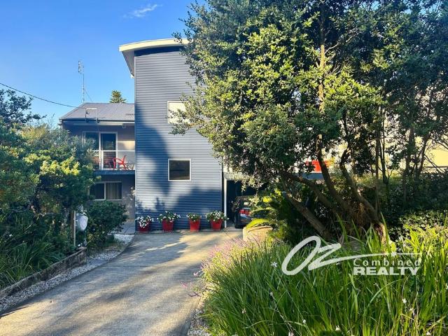 Stunning Coastal Retreat with Water Views electricity and water included