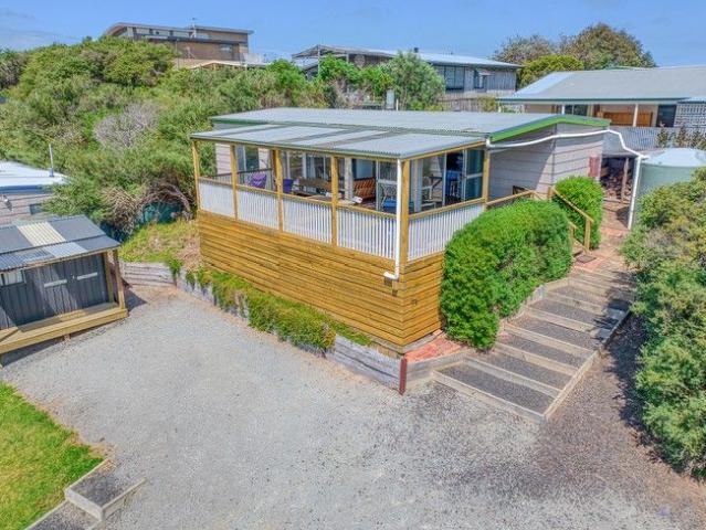 Beautifully Maintained Coastal Retreat with Stunning Outlook