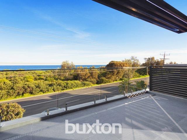 STUNNING COASTAL TOWNHOUSE WITH BREATHTAKING BAY VIEWS