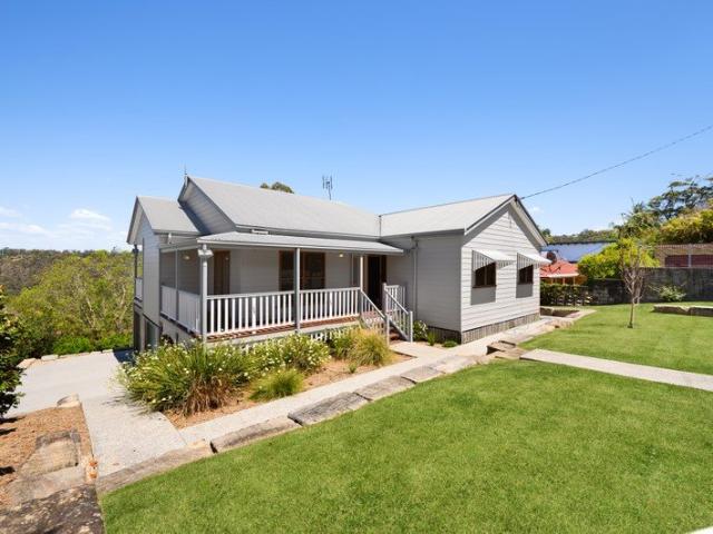 Stunning Coastal Views, Beautiful Gardens & Renovated Family Living
