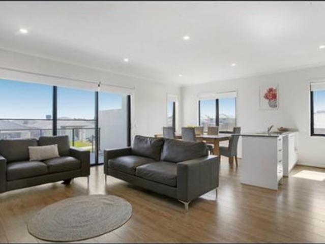 Stunning corner townhouse with spacious yard!