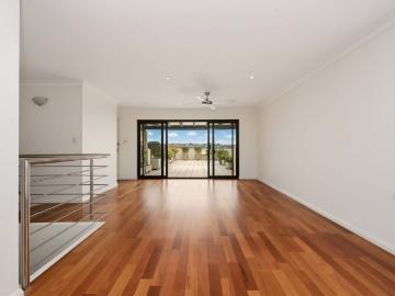 Stunning Dual Level Penthouse with Sweeping Coastal Views