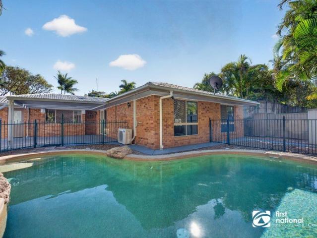 STUNNING FAMILY HOME WHICH SHOWCASES SUMMER LIVING AT ITS FINEST POOL ! SPACE !. AND FAMILY COMFORT IN BEAUTIFUL WELLINGTON POINT